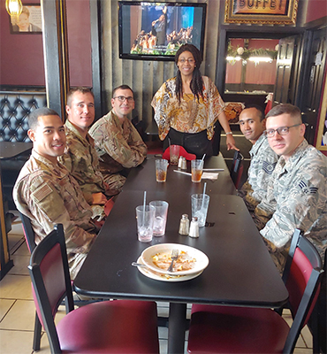 Military personnel dining at Mama Sheila's House of Soul in Minneapolis, Minnesota.